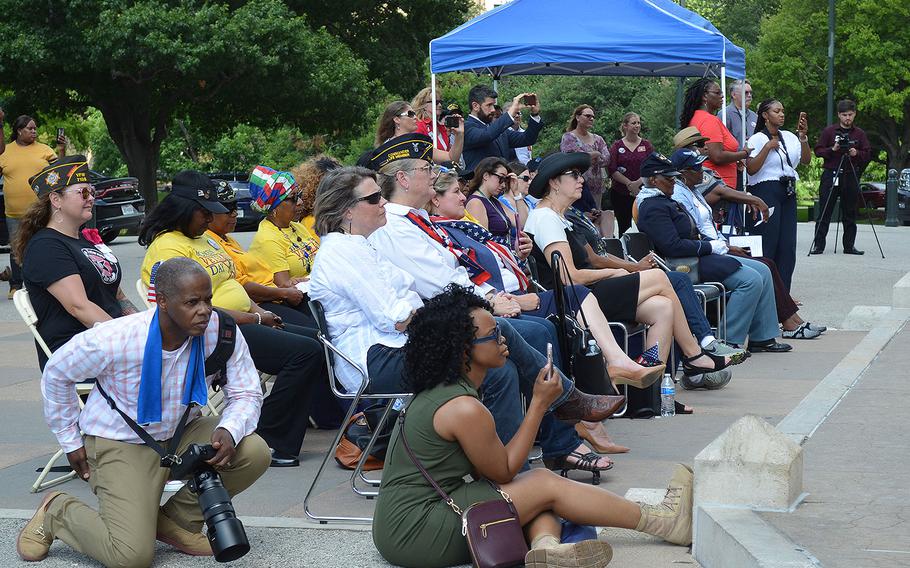 Attendees listen and take photos at Texas’s first Women Veterans Day celebration held on the steps of the Texas State Capitol on June 12, 2018. Around 200 people attending the ceremony. 