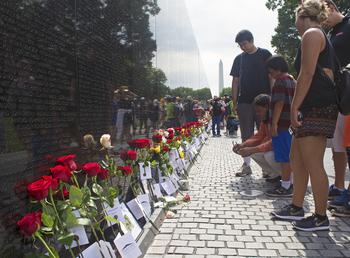 The colored roses for the annual Father’s Day Rose Remembrance each had a meaning: The 1,400 red roses were for those killed in action, the 1,200 yellow roses were for those missing in action, and the 400 white with red tips roses symbolize In Memory honorees - Vietnam veterans who died after the war from war related causes. 