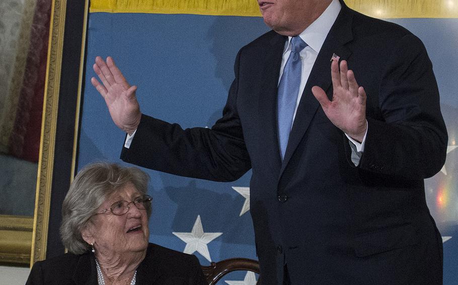 President Donald Trump presents Pauline Conner, widow of Garlin "Murl" Conner, with the Medal of Honor. Garlin Conner, a WWII Army lieutenant, was posthumously awarded the Medal of Honor on June 26, 2018.
