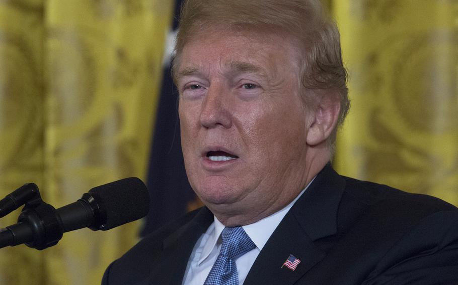 President Donald Trump offers remarks during the Medal of Honor ceremony for Garlin "Murl" Conner at the White House on June 26, 2018. Trump presented Conner's widow, Pauline, with a posthumous Medal of Honor. 