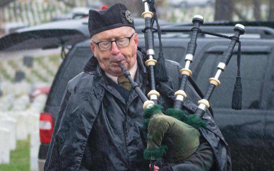 A man plays the bagpipes before the start of a ceremony for Wreaths Across America at The US Soldiers' and Airmen's Home National Cemetery on Dec. 15, 2018, in Washington, D.C. 