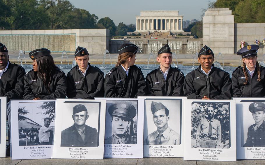 Veterans Day at the World War II Memorial involved a wreath-laying ceremony and a Parade of Heroes. During the Parade of Heroes, a World War II veteran was called and his military history read aloud. 