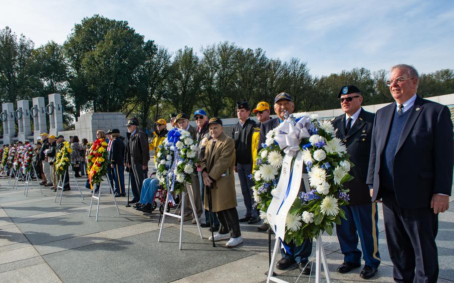 Veterans Day at the World War II Memorial involved a wreath-laying ceremony and a Parade of Heroes. During the Parade of Heroes, a World War II veteran was called and his military history read aloud. 