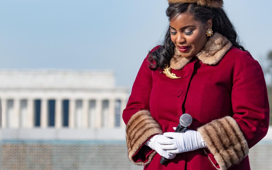 Singer and actress Mary Millben during Veterans Day at the World War II Memorial, which involved a wreath-laying ceremony and a Parade of Heroes. During the Parade of Heroes, a World War II veteran was called and his military history read aloud. 