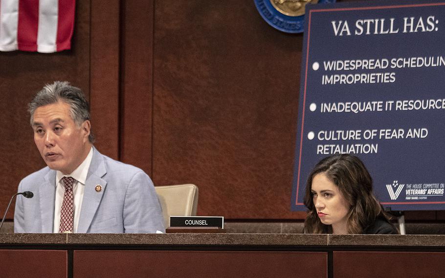 House Veterans' Affairs Committee Chairman Rep. Mark Takano, D-Calif., makes his opening statement during a hearing on the situation with wait times at VA hospitals, five years after the Phoenix scandal, July 24, 2019 on Capitol Hill. Behind him is a poster listing the problems he says the VA still encounters.