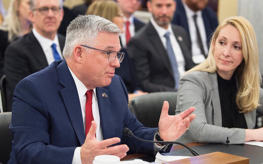 Richard Stone, executive in charge of the Veterans Health Administration, answers questions on Wednesday, Feb. 5, 2020, during a Senate Veterans' Affairs Committee hearing on Capitol Hill in Washington. Looking on at right is Jennifer MacDonald, who was also testifying on behalf of the Veterans Health Administration.