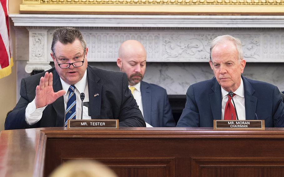 Senate Veterans Affairs Committee Ranking Member Sen. Jon Tester, D-Mont., asks questions to witnesses during a hearing on Capitol Hill in Washington on Wednesday, Feb. 5, 2020. Looking on at right is committee Chairman Jerry Moran, R-Kansas.