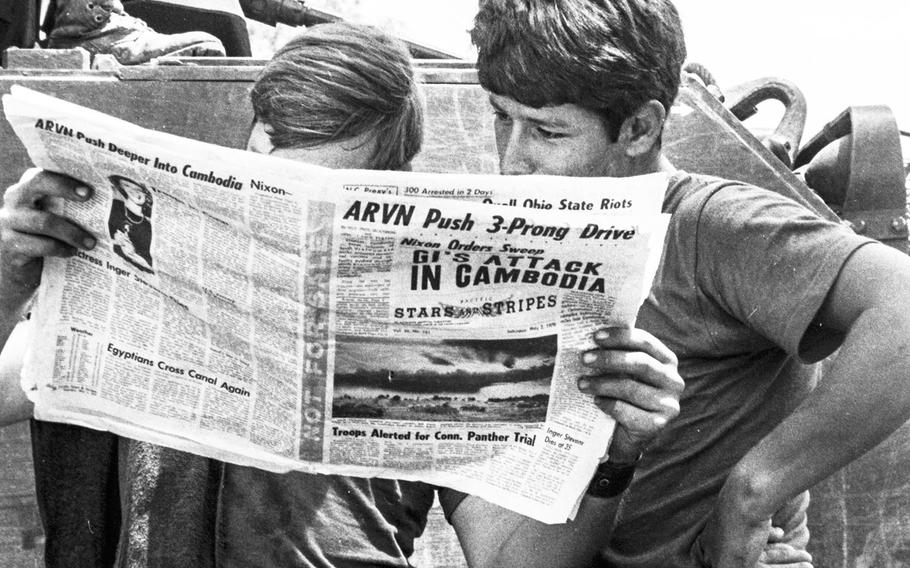 In a May, 1970 photo, soldiers taking part in Operation Fishhook in Cambodia read Stars and Stripes' coverage of the events.