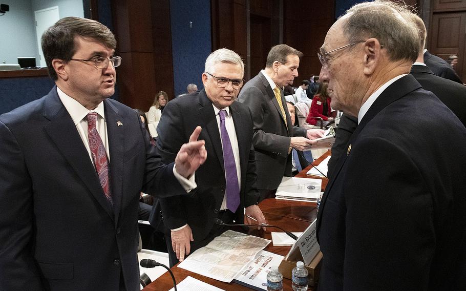 Secretary of Veterans Affairs Robert Wilkie talks with House Veterans' Affairs Committee Ranking Member Rep. Phil Roe, R-Tenn, before a hearing on the VA budget, Feb. 27, 2020 on Capitol Hill.