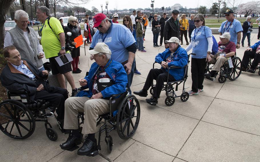 Greater St. Louis Honor Flight veterans line up to meet former Sen. Bob Dole at the National World War II Memorial in Washington, D.C., March 30, 2019.