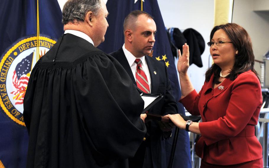 In a May, 2009 photo, Tammy Duckworth, then-assistant secretary of veterans affairs for public and intergovernmental affairs, is sworn into federal office by Judge John J. Farley, left, U.S. Court of Appeals for Veterans Claims. Duckworth’s husband, Army National Guard Maj. Bryan Bowlsbey, presided over the oath. Duckworth is one of the people who is being mentioned as a possible VA secretary in the Biden administration.