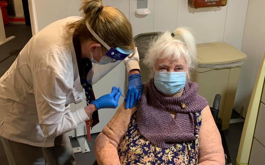 World War II Veteran Margaret Klessens, 96, a resident at the Community Living Center in the Edith Nourse Rogers Memorial Veterans Hospital at VA Bedford, Mass., is the first VA patient nationwide to receive the COVID-19 vaccine, Dec. 14, 2020.