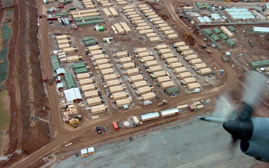 An aerial shot of Camp Stronghold Freedom at Karshi-Khanabad Air Base in Uzbekistan in 2002. Hundreds of veterans who have had cancer believe it was caused by exposure to toxins at the base.

