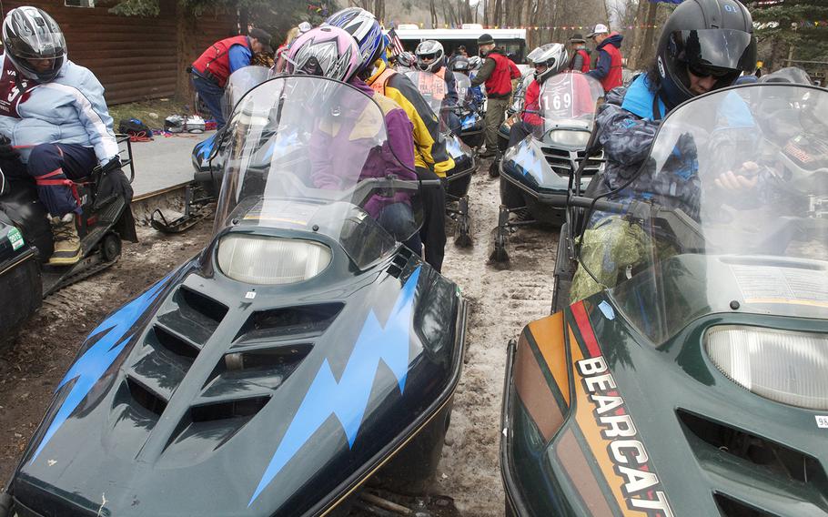 Veterans get ready to snowmobile during the annual the National Disabled Veterans Winter Sports Clinic at Aspen Snowmass Resort in Colorado in April 2015. Rehabilitation experts say sports offer much more than fun for severely wounded veterans -- they can help speed recovery, lift depression and increase independence.