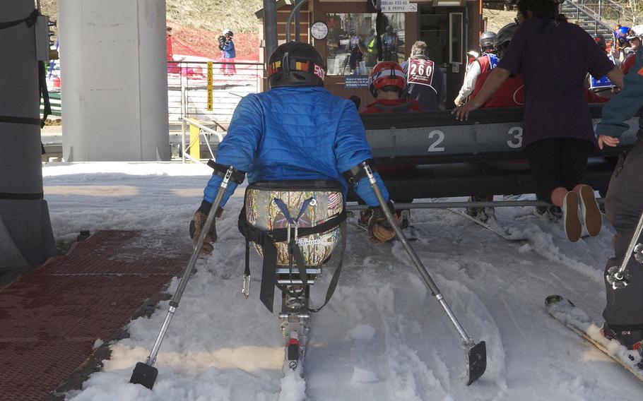 A disabled veteran waits to get on the ski lift at the National Disabled Veterans Winter Sports Clinic at Aspen Snowmass Resort in Colorado in April 2015. Each year, the famed ski resort becomes an open-air rehabilitation clinic for hundreds of veterans.
