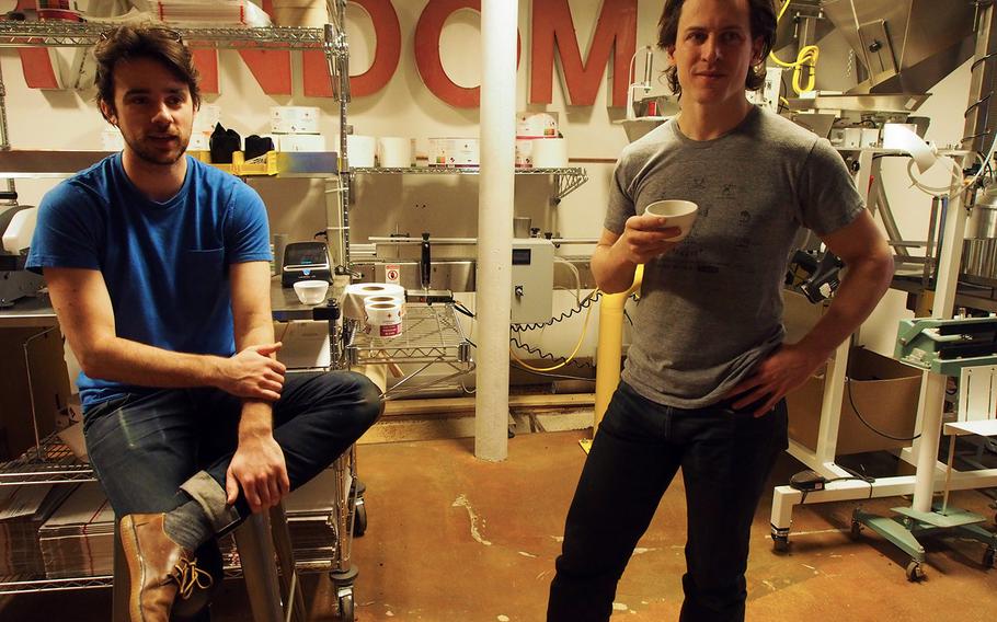 Marine veterans Harrison Suarez, left, and Michael Haft, opened Compass Coffee in Washington, D.C., less than a year ago and it quickly became one of the capital area's most popular cafes. The duo are one of a wave of post-9/11 entrepreneurs opening businesses after leaving the Armed Forces.