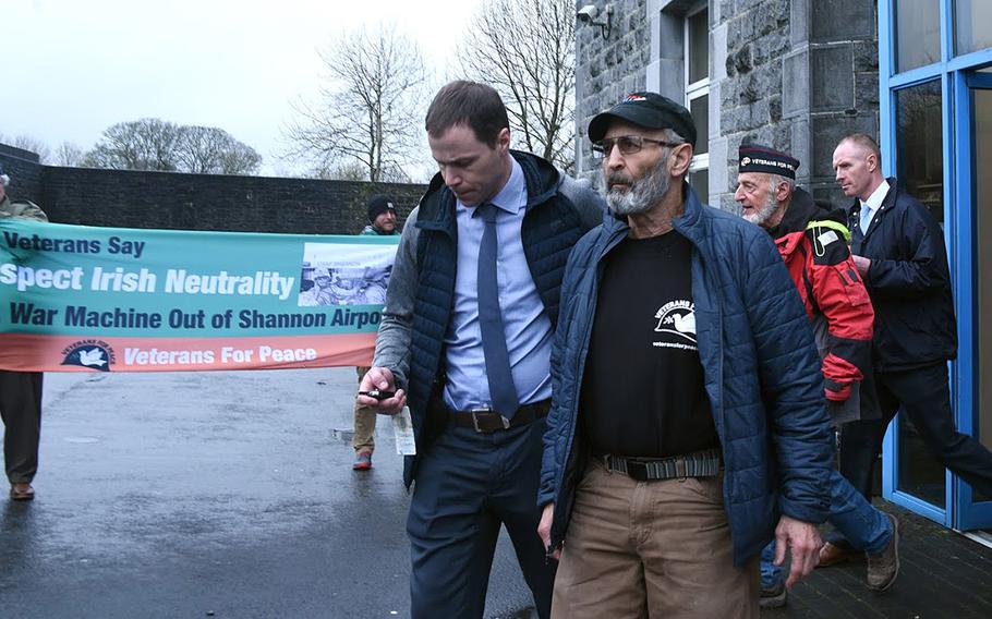 U.S. Veterans for Peace activists Ken Mayers and Tarak Kauff are shown following their March 18, 2019, arraignment in Ennis, Ireland.The veterans turned peace activists are awaiting trial on charges of trespassing in connection with allegations they approached a suspected U.S. military aircraft on layover at the Shannon Airport.