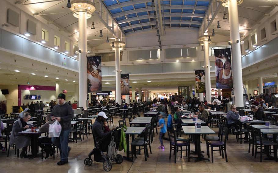 Customers eat and shop inside the Kaiserslautern Military Community Center at Ramstein Air Base, Germany. Under a new law that became effective Jan. 1, more disabled veterans can now shop on base. Germany is the only overseas location so far where military and local officials have established a procedure for veterans to access the benefits.