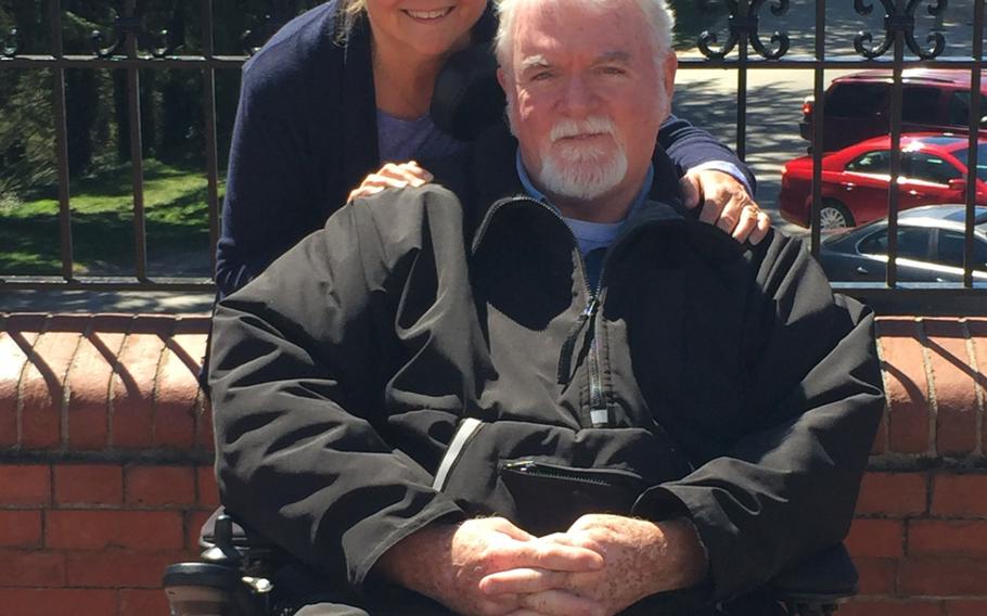Mary Hahn Ward is shown with her husband Tom, a Vietnam-era Marine veteran who in 2010 was diagnosed with amyotrophic lateral sclerosis, also known as Lou Gehrig's disease. The coronavirus pandemic has increased the physical and mental burden on caregivers like Ward, whose husband is at high risk from the virus.
