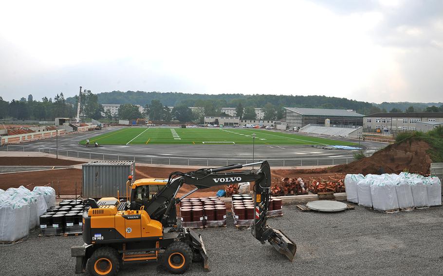 Construction on the new Kaiserslautern High School stadium is progressing and should be ready to see action in spring 2013. The artificial grass field will be surrounded by an eight-lane track. It will also have facilities for field events. At far right is Kaiserslautern Elementary School and next to it is a new multipurpose room that is under construction. A new high school and elementary school are scheduled to be built in the near future.
