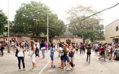 Students take a break during the first day of school at Seoul American Middle School.  