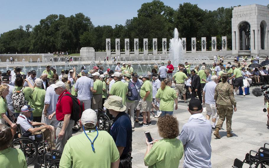 Veterans and their guardians participating in an Honor Flight gather at the National World War II Memorial in Washington, D.C., on Wednesday, July 10, 2019. Because of the coronavirus pandemic, the Honor Flight Network said Thursday, June 11, 2020, that it would cancel all trips to the nation’s capital through the end of 2020.
